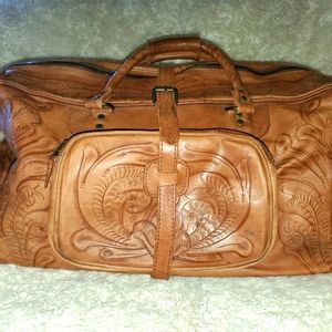 Leaders in Leather carry-on bag